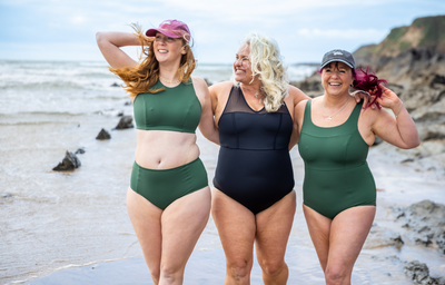 (L-R) Allie wears size 14 Hepburn; Jude wears The Essential Swimsuit Black in size 16 Hendricks; Terri wears the Vitamin Sea Suit in size 14 Monroe